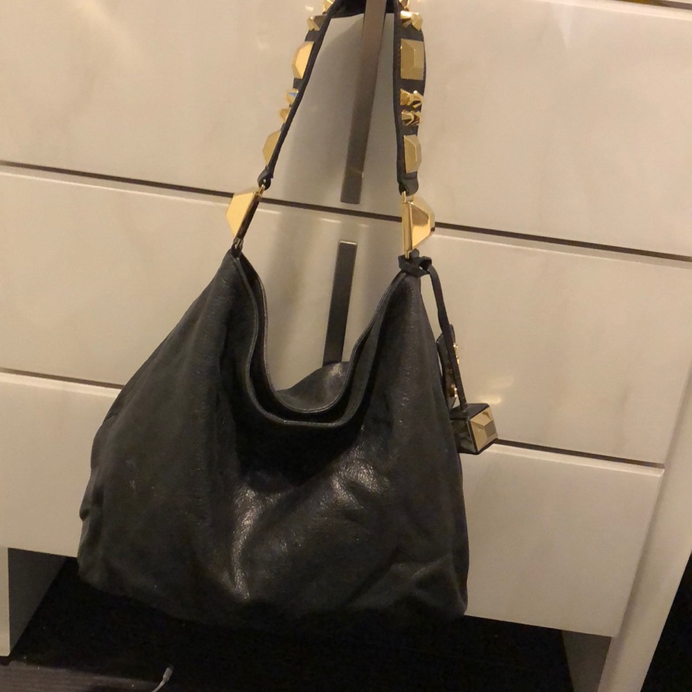 Betsy Johnson black leather bag. Gold hardware